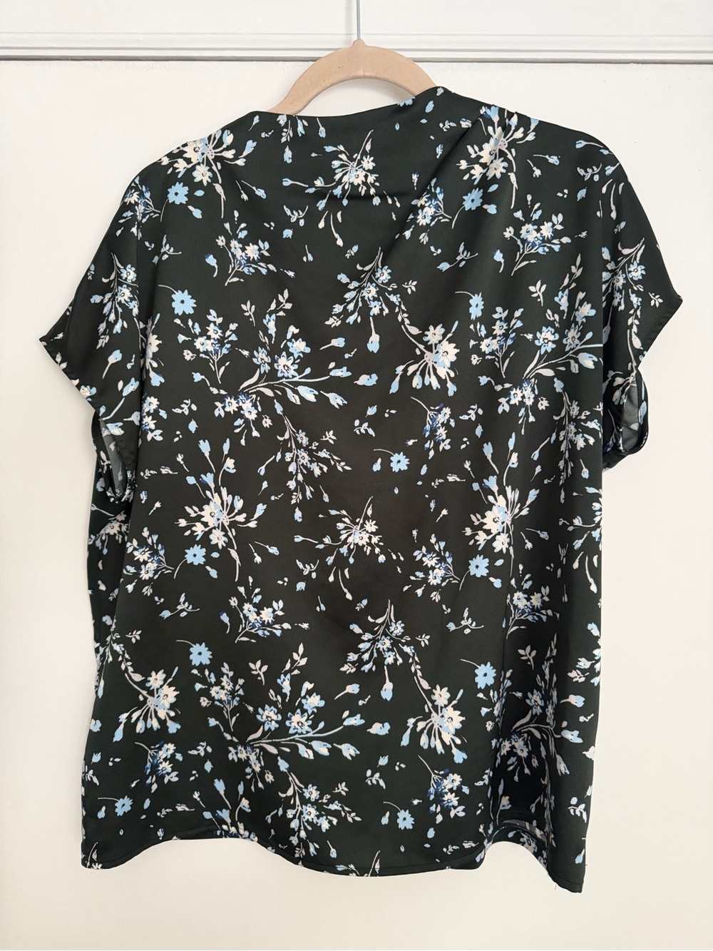 Dark Green Floral Short-Sleeve Womenโs Blouse with Light Blue Accents